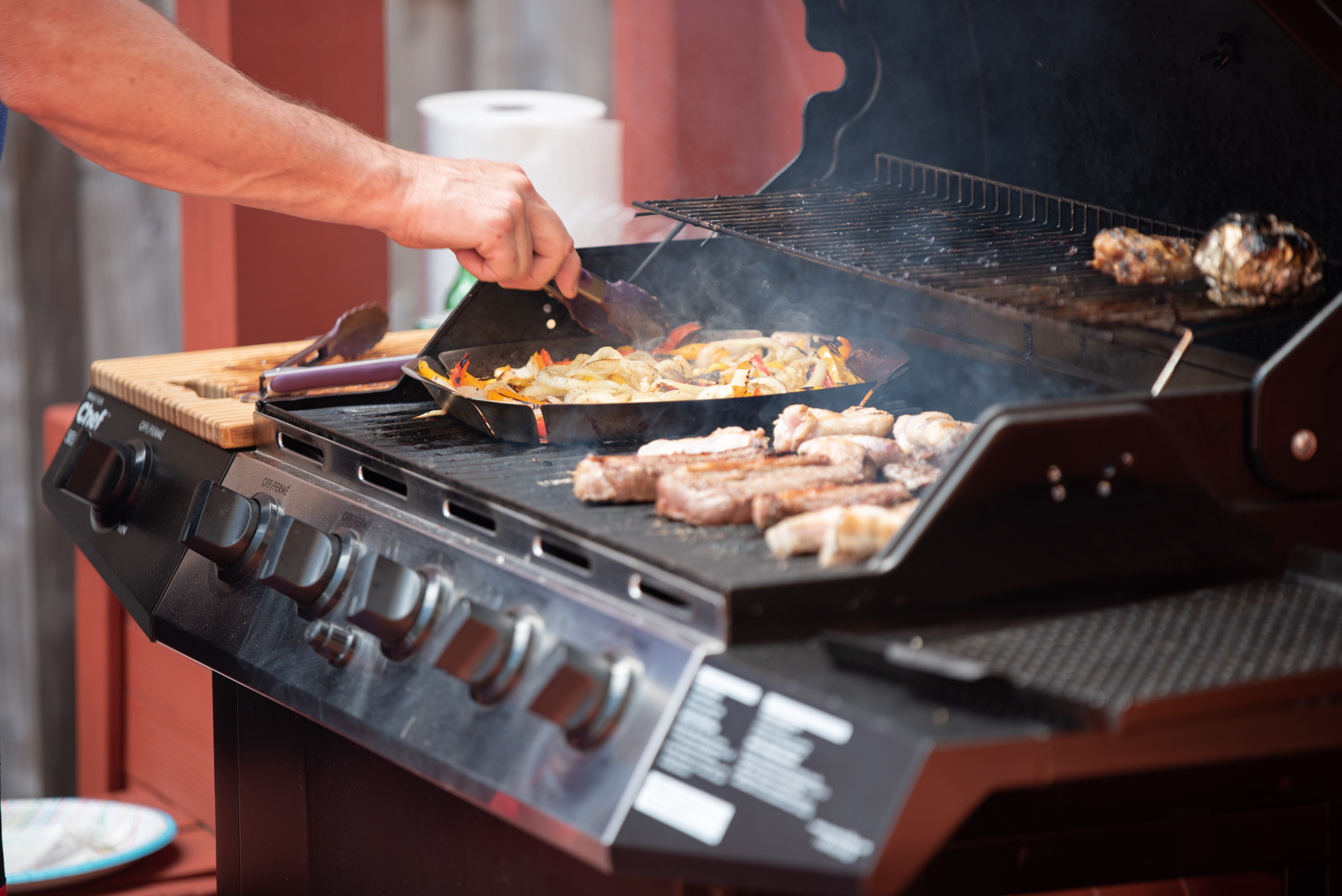 Person prepping a BBQ