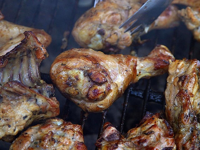 chicken pieces on a grill