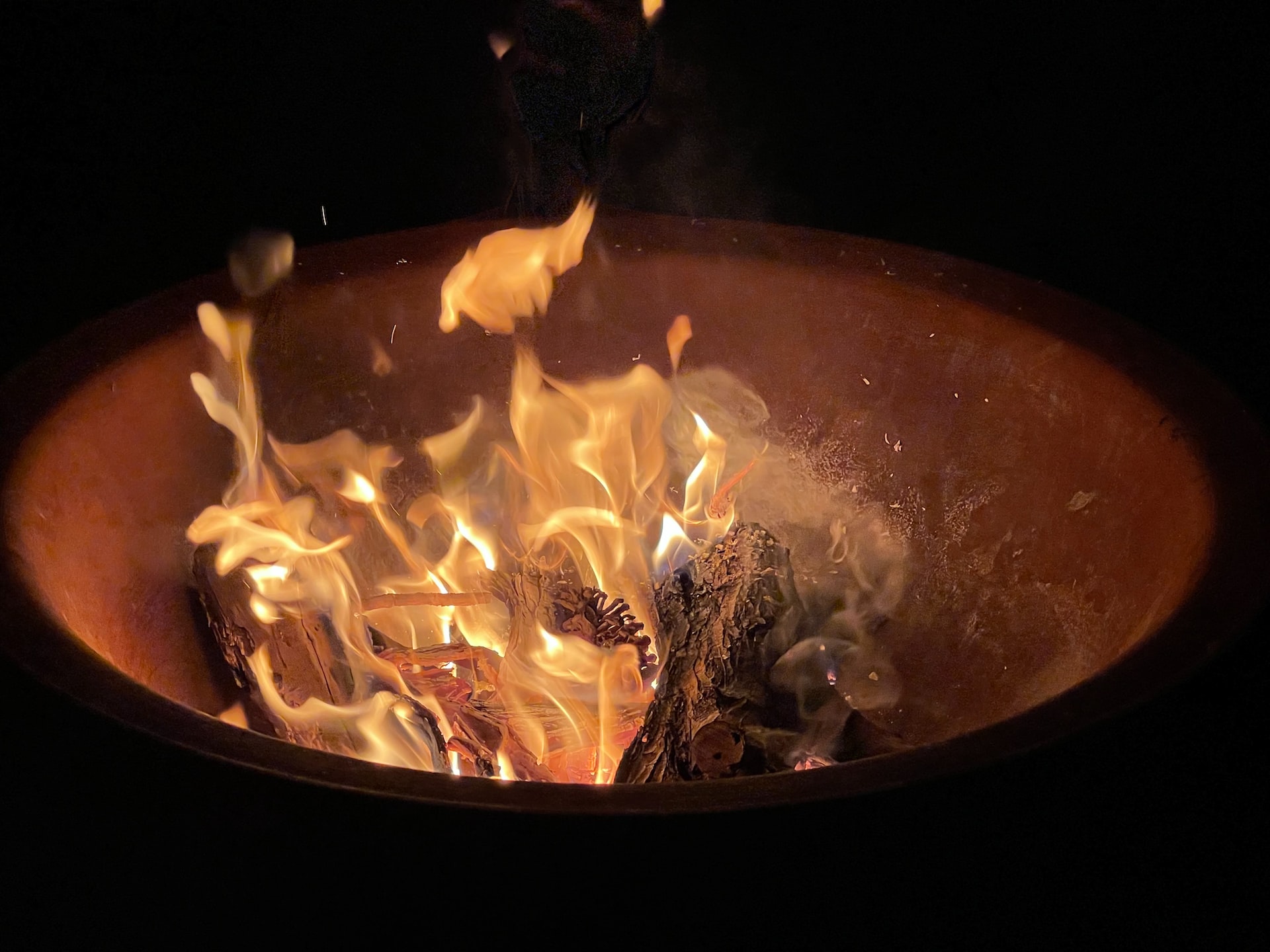 Fire roaring in a fire pit