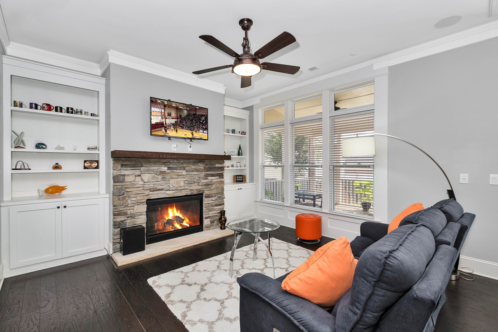 Wide view of a living room with a fireplace