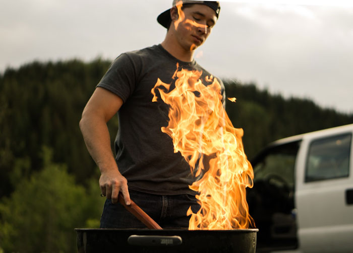  Man preparing barbecue